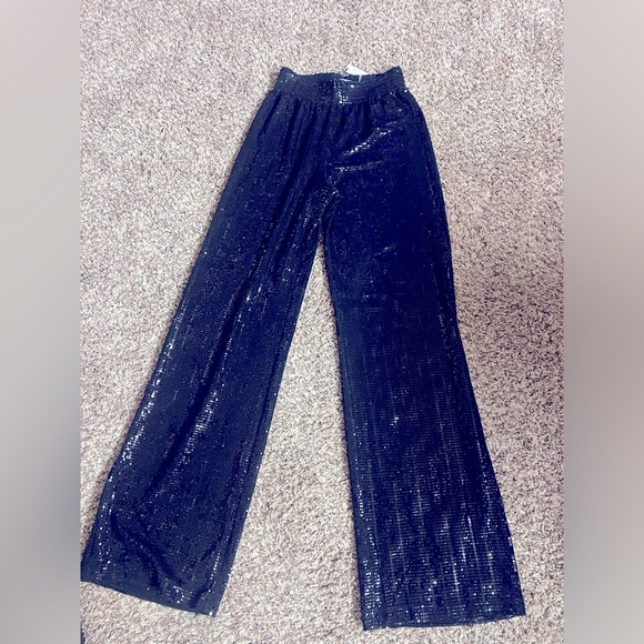 Brand new shiny long pants. Super elegant.
